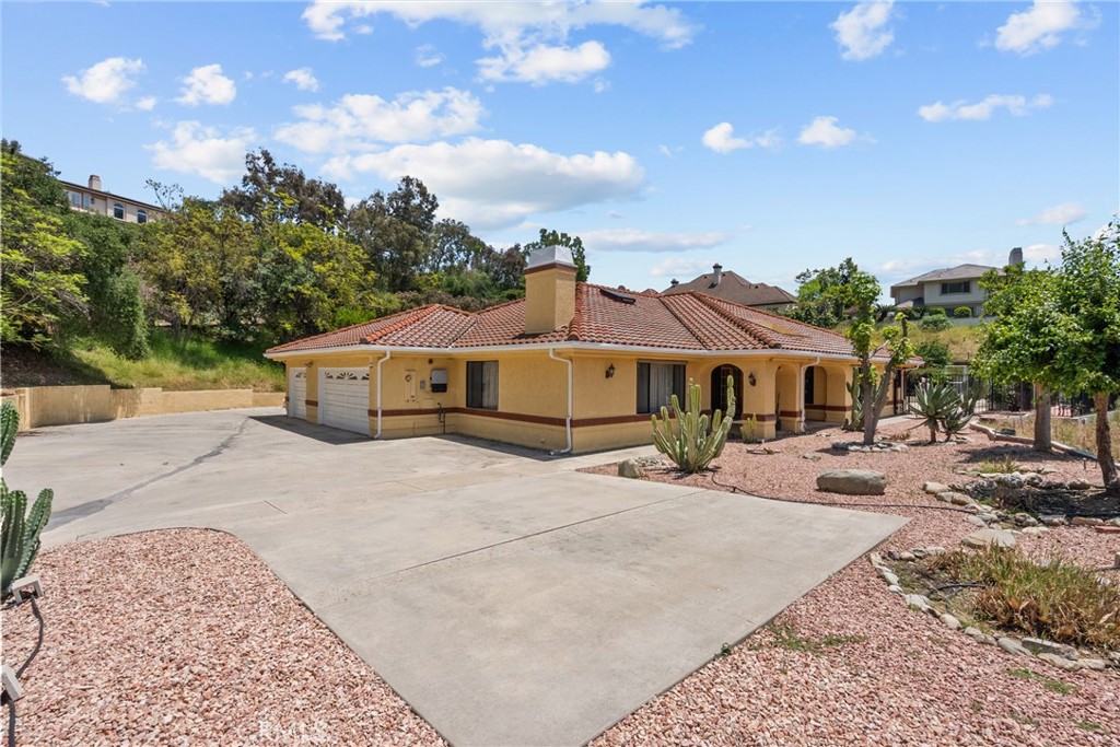 52 Hidden Valley Road Monrovia, CA 91016 - Photo 6 of 55 a front view of a house with yard