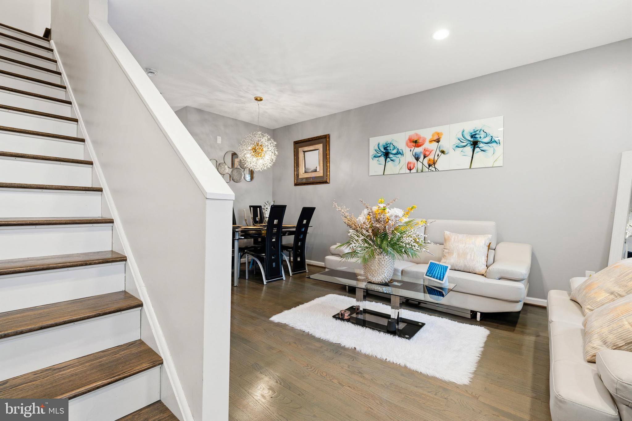 4285 South Capitol Street Southwest Washington, DC 20032 - Photo 14 of 24 a living room with furniture and wooden floor