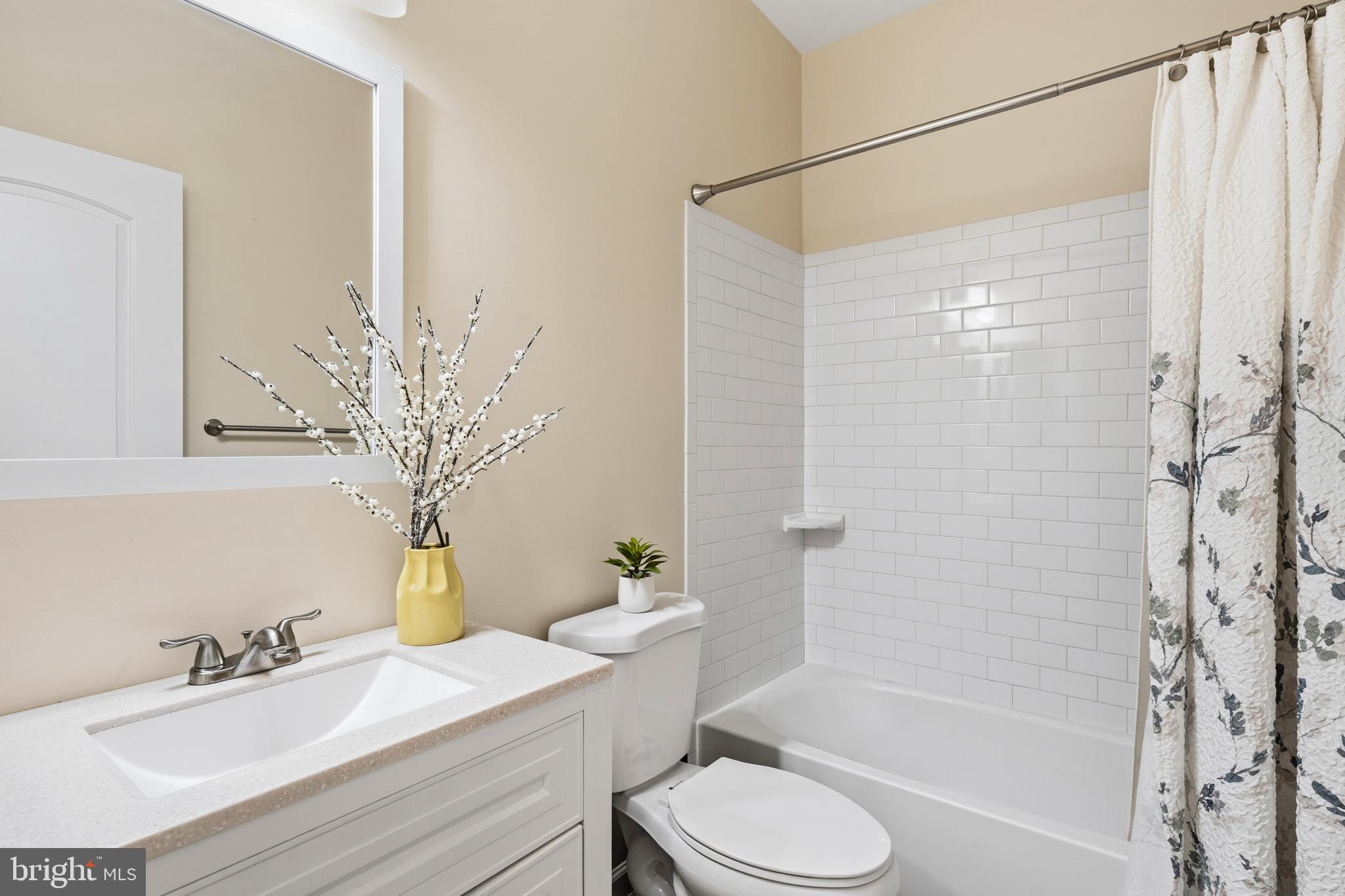4285 South Capitol Street Southwest Washington, DC 20032 - Photo 18 of 24 a bathroom with a sink toilet and shower