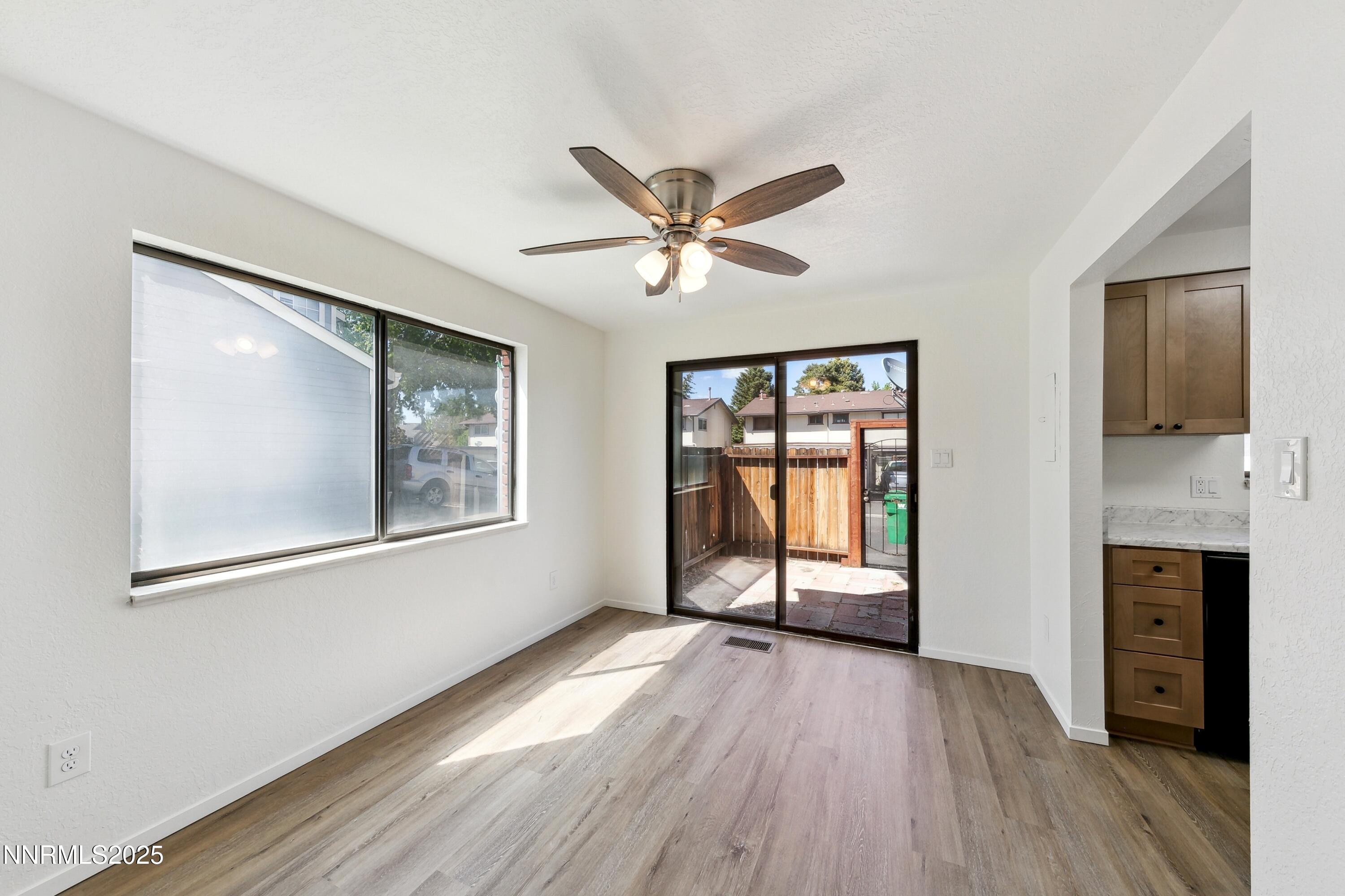 718 Travis Drive, Unit D Carson City, NV 89701 - Photo 7 of 19 a view of a livingroom with a flat screen tv