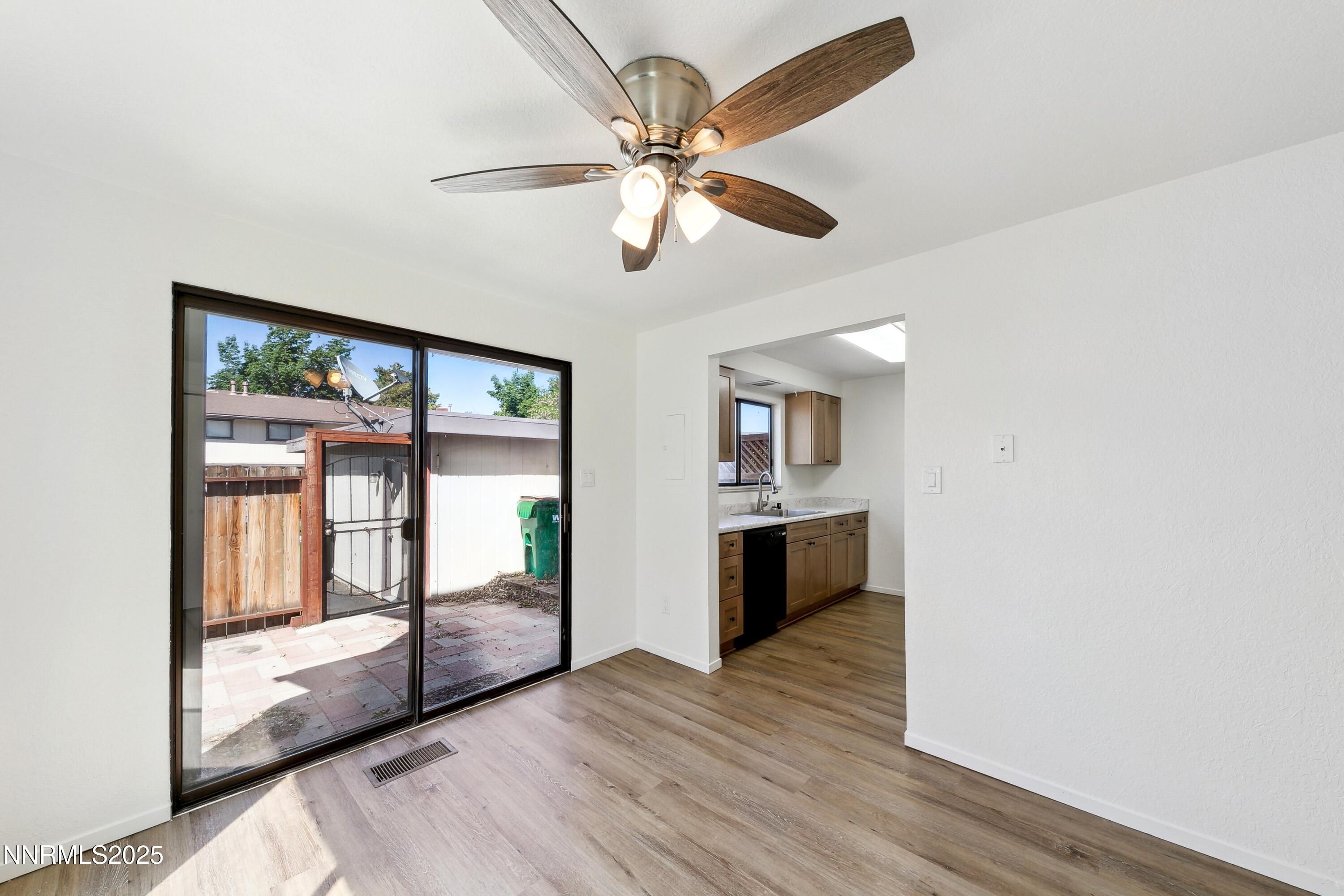 718 Travis Drive, Unit D Carson City, NV 89701 - Photo 8 of 19 a view of an empty room and window