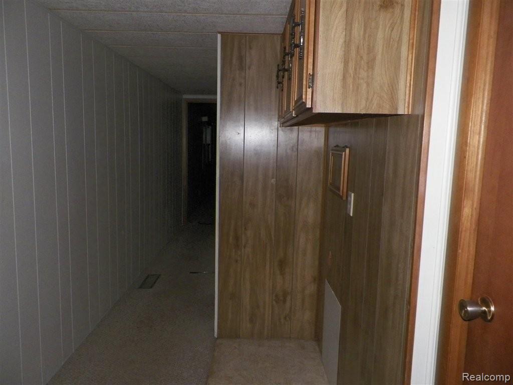 5677 Hanes Road Vassar, MI 48768 - Photo 15 of 23 262-168479 - Hallway - Laundry A