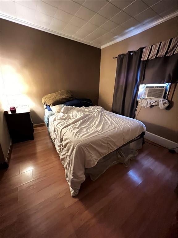 442 East Washington Street Rochester, PA 15074 - Photo 11 of 23 a bedroom with a bed and a mirror