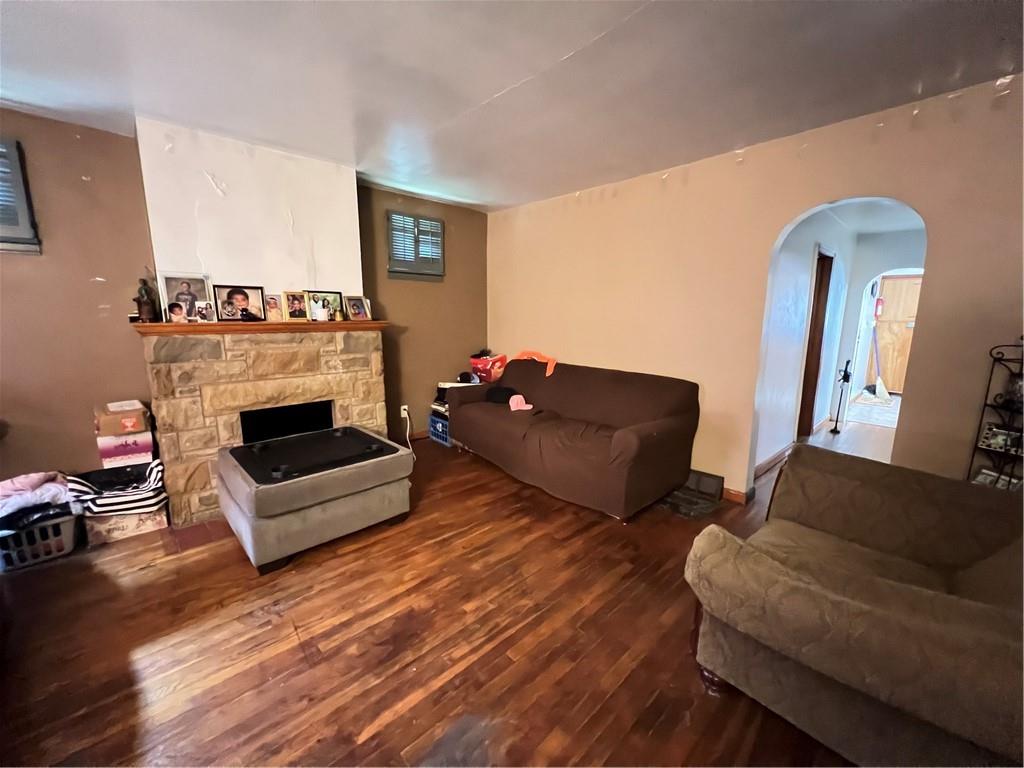 442 East Washington Street Rochester, PA 15074 - Photo 6 of 23 a living room with furniture and a fireplace