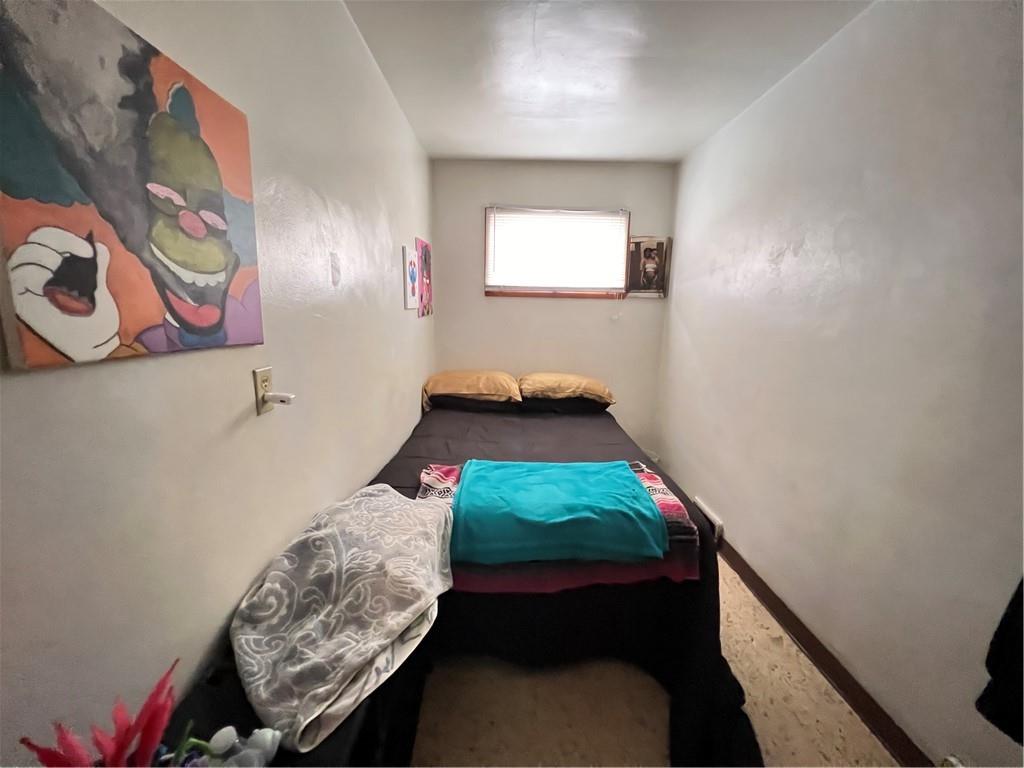 442 East Washington Street Rochester, PA 15074 - Photo 9 of 23 a bedroom with bed and a window