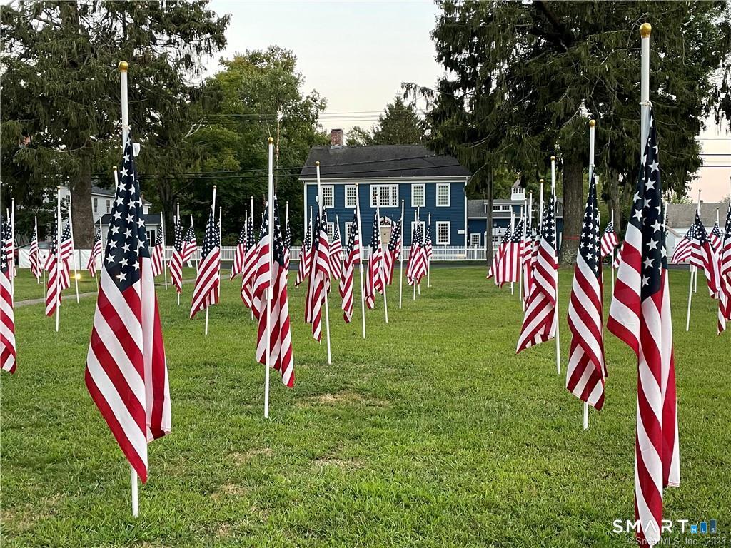 3 Sandgate Circle, Unit 3 Madison, CT 06443 - Photo 38 of 39 Flags of Remembrance of Town Green