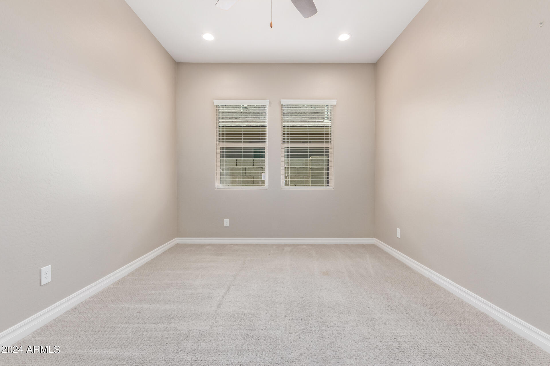 43944 Stonecreek Road Maricopa, AZ 85139 - Photo 12 of 62 an empty room with a window