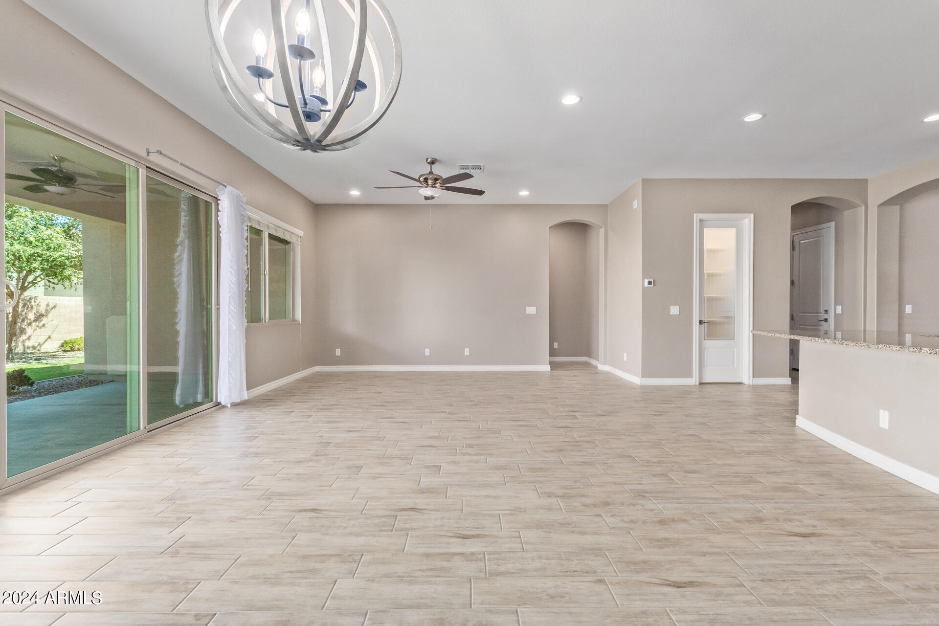 43944 Stonecreek Road Maricopa, AZ 85139 - Photo 15 of 62 a view of an empty room with a window