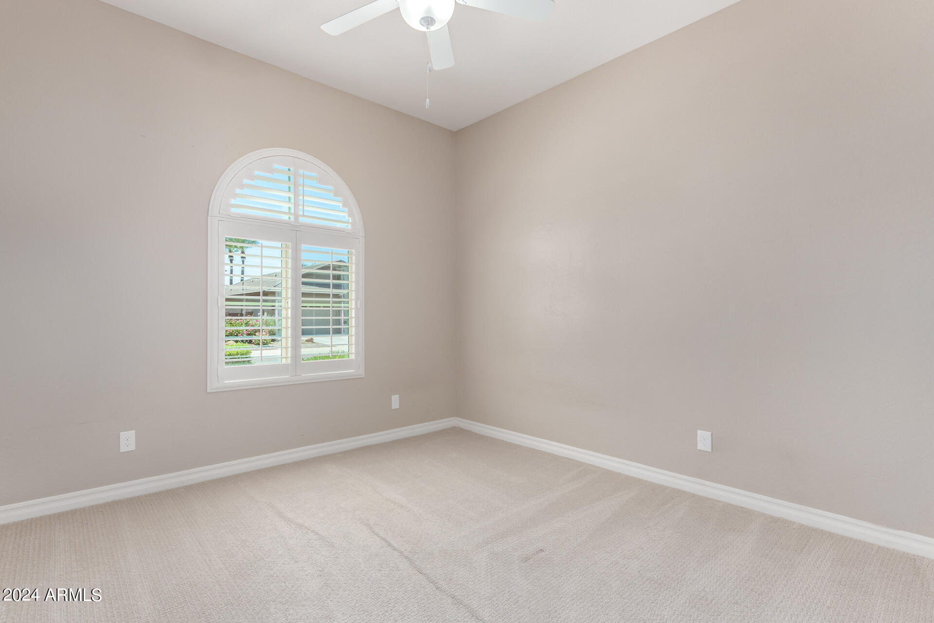 43944 Stonecreek Road Maricopa, AZ 85139 - Photo 31 of 62 an empty room with a window