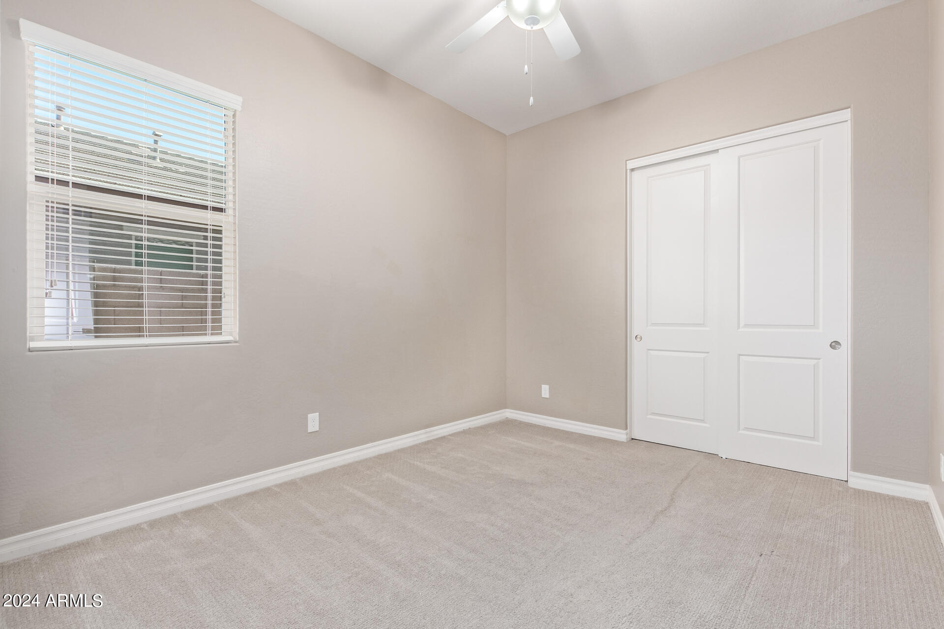 43944 Stonecreek Road Maricopa, AZ 85139 - Photo 39 of 62 an empty room with windows