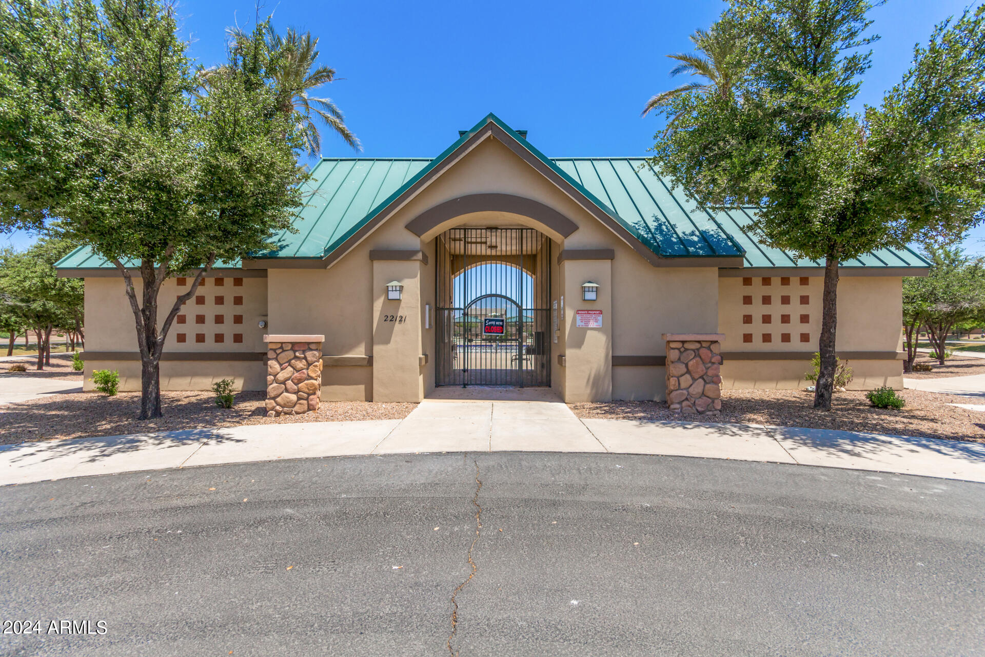 43944 Stonecreek Road Maricopa, AZ 85139 - Photo 53 of 62 a view of a house with a patio and a yard