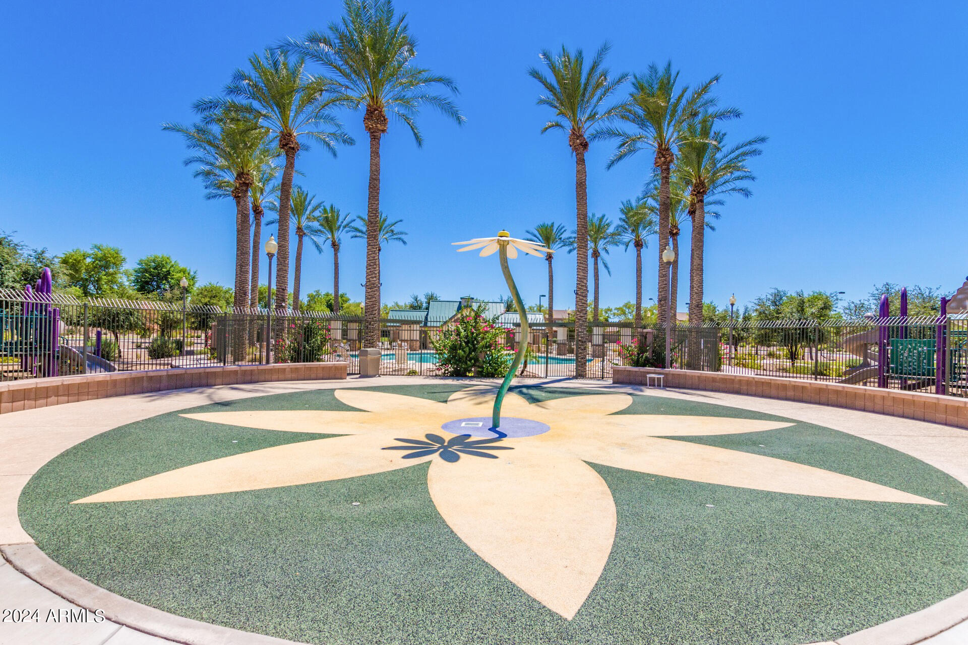 43944 Stonecreek Road Maricopa, AZ 85139 - Photo 54 of 62 a view of a swimming pool with a table and chairs