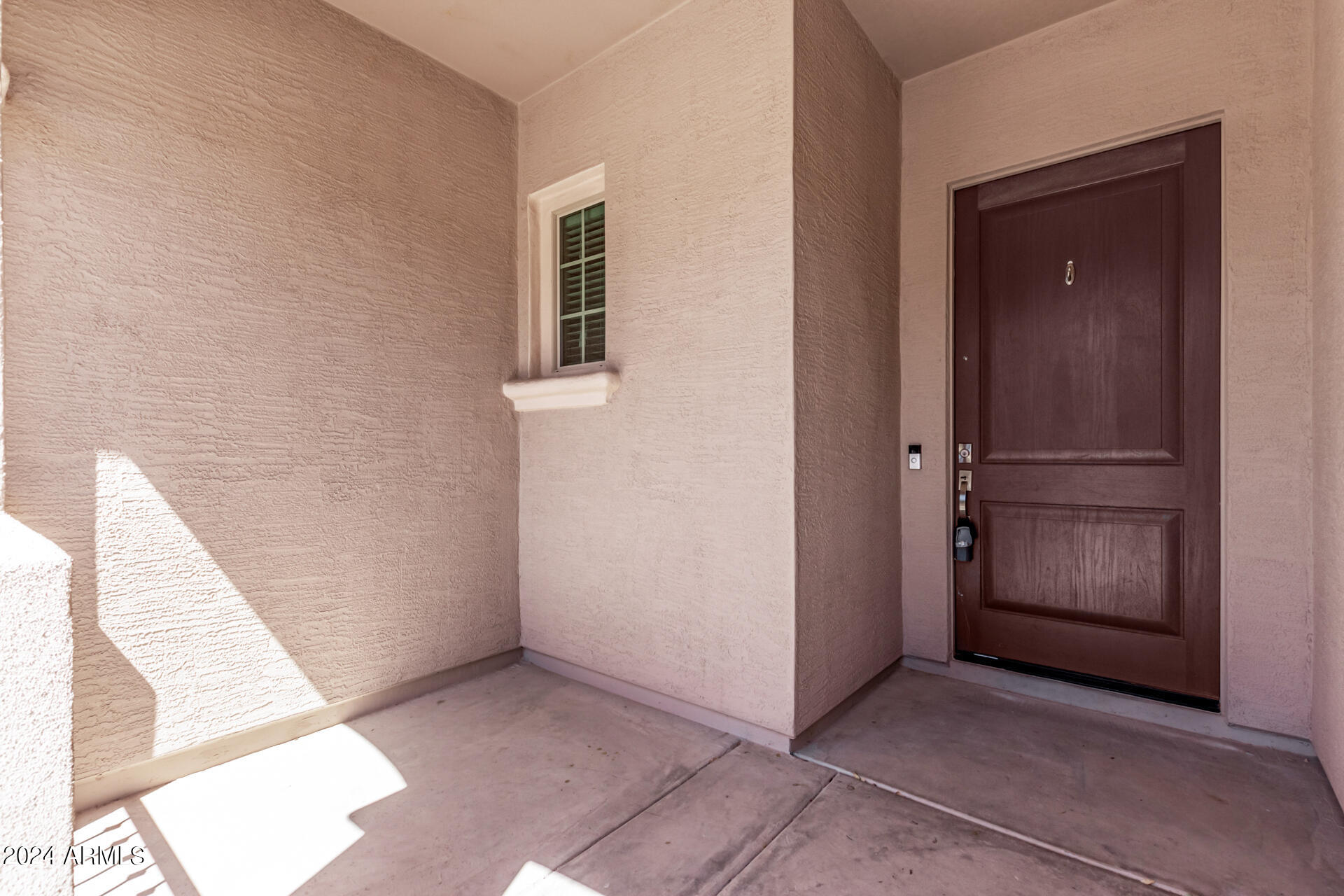 43944 Stonecreek Road Maricopa, AZ 85139 - Photo 6 of 62 an empty room with windows