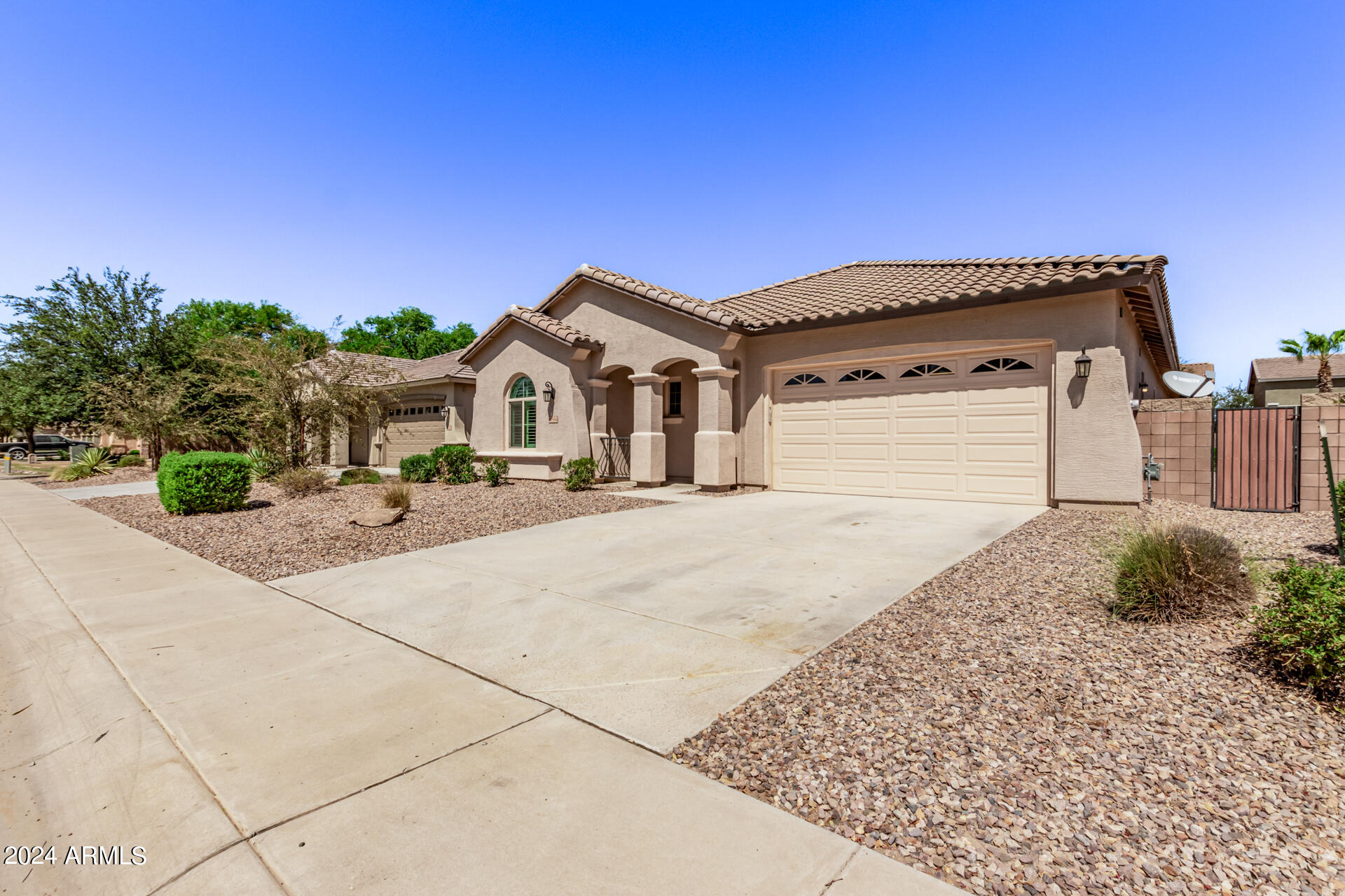 43944 Stonecreek Road Maricopa, AZ 85139 - Photo 10 of 62 a front view of a house with a yard