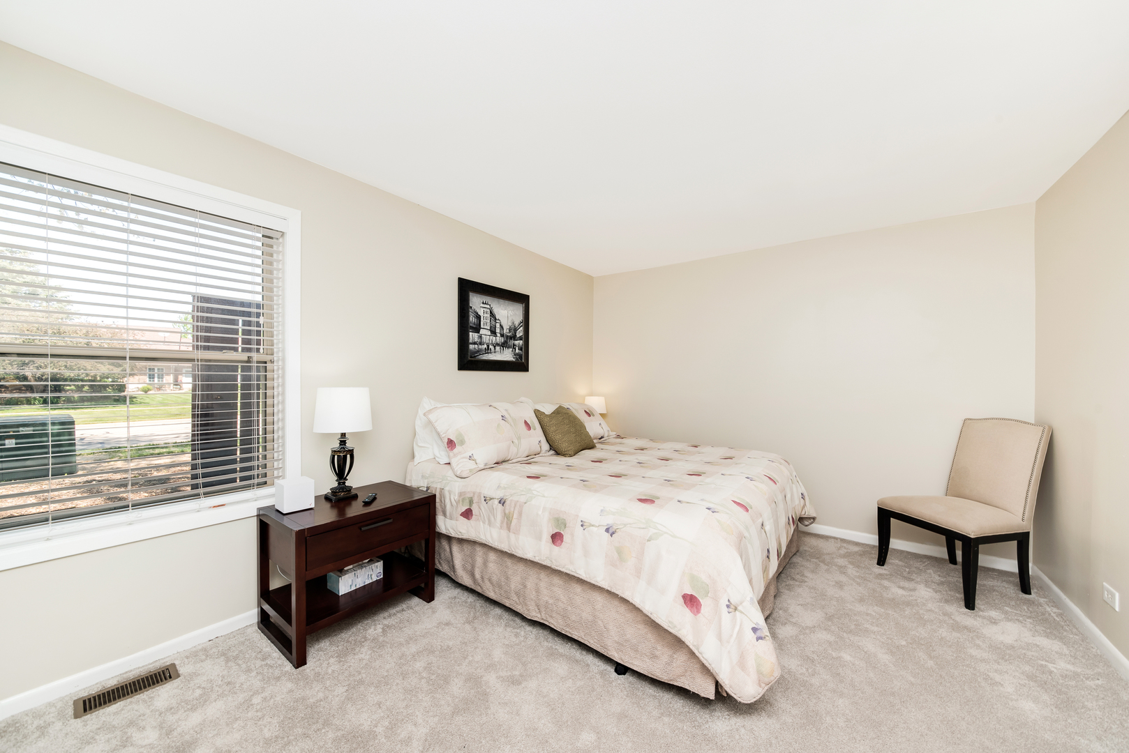 1364 McDowell Road, Unit 103 Naperville, IL 60563 - Photo 11 of 19 a bedroom with a bed chair and window