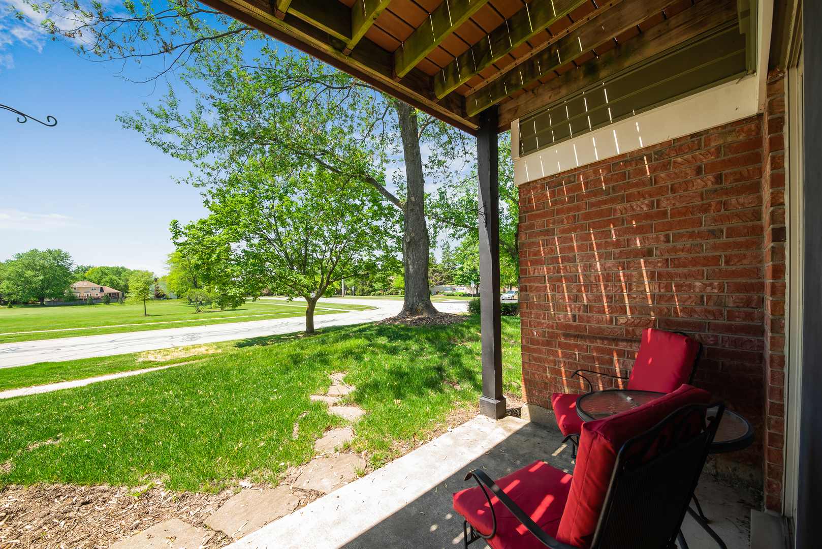 1364 McDowell Road, Unit 103 Naperville, IL 60563 - Photo 16 of 19 a view of a chairs and table in the patio