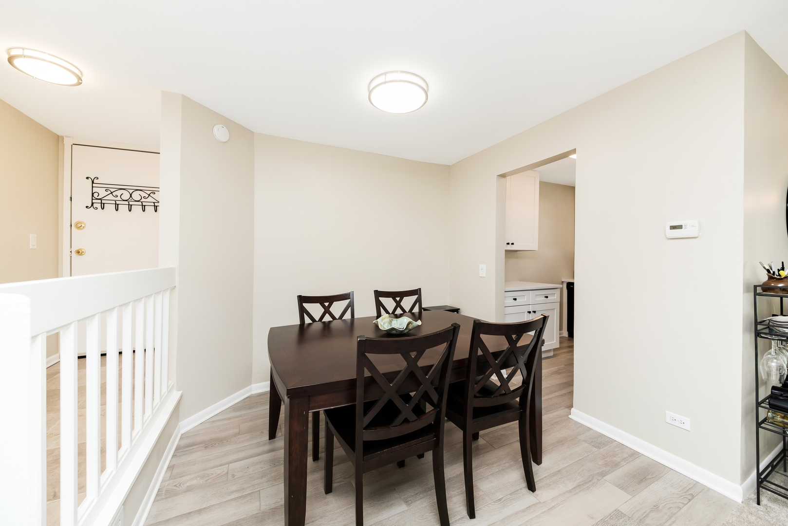 1364 McDowell Road, Unit 103 Naperville, IL 60563 - Photo 6 of 19 a view of a dining room with furniture