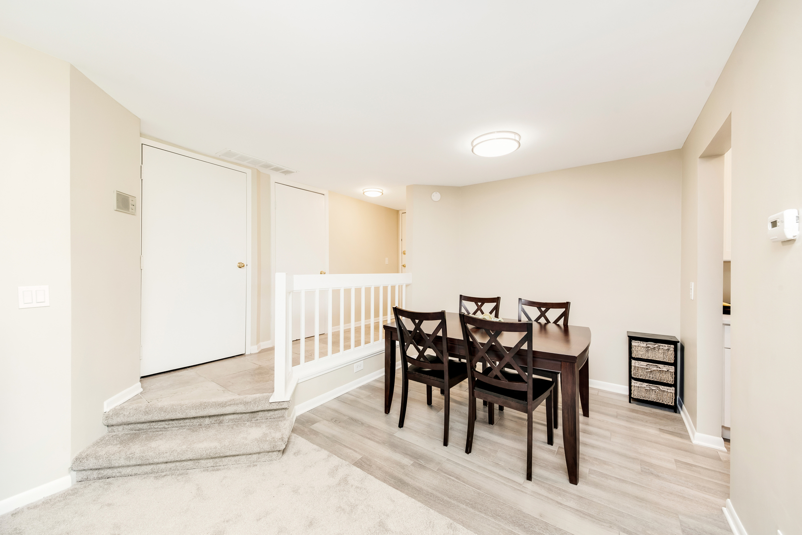 1364 McDowell Road, Unit 103 Naperville, IL 60563 - Photo 7 of 19 a view of a dining room with furniture