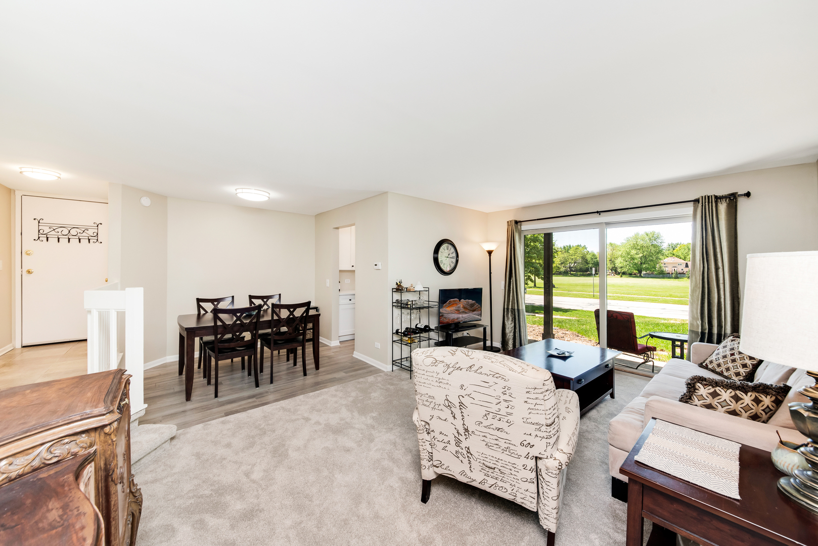 1364 McDowell Road, Unit 103 Naperville, IL 60563 - Photo 9 of 19 a living room with furniture and large windows
