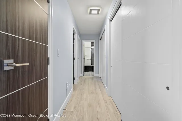 a bathroom with a sink toilet and mirror