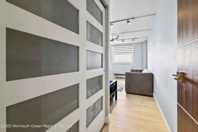 a bedroom with a bed and furniture