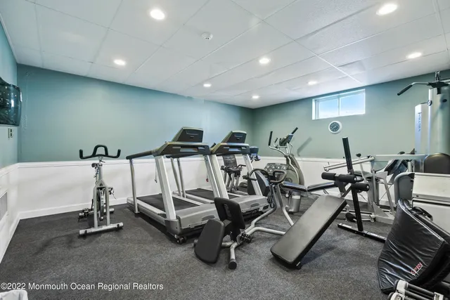 a bathroom with a shower and a mirror