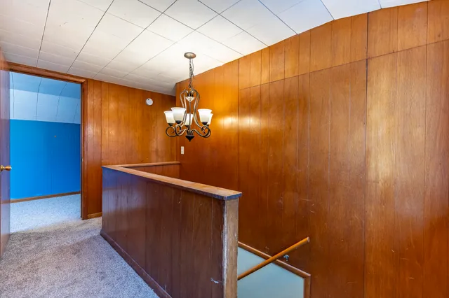 a view of livingroom with hardwood floor and hallway