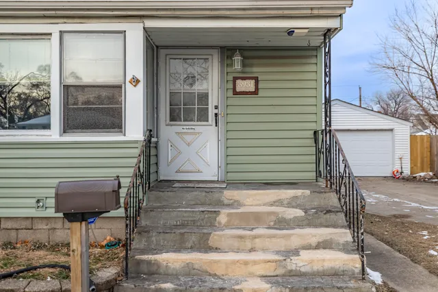 a front view of a house with a porch
