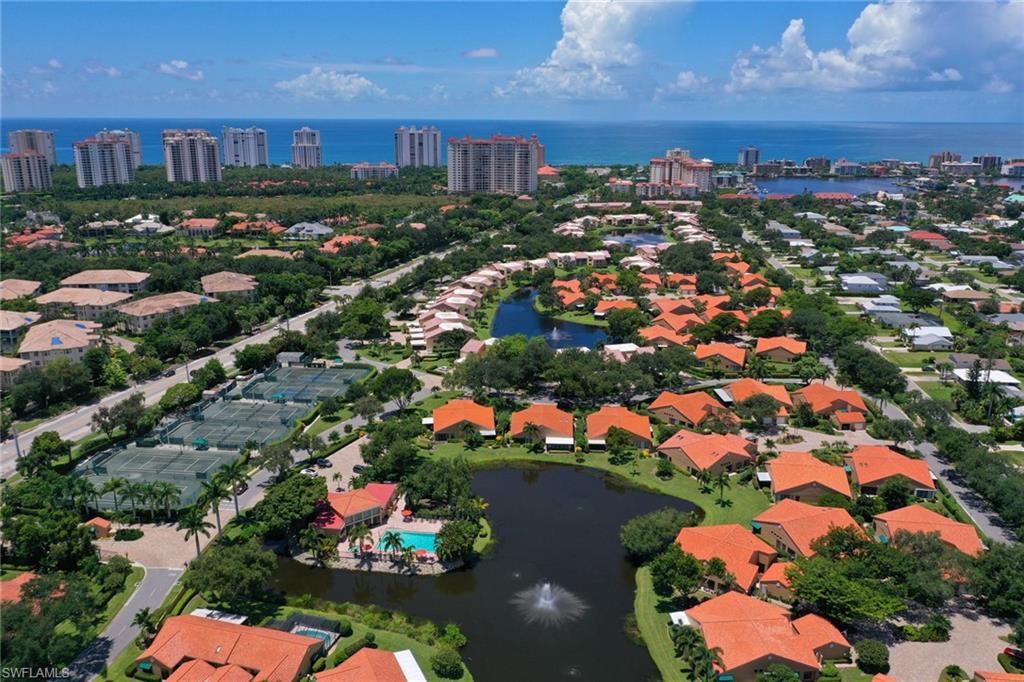 805 Reef Point Circle Naples, FL 34108 - Photo 32 of 33 an aerial view of residential houses with outdoor space