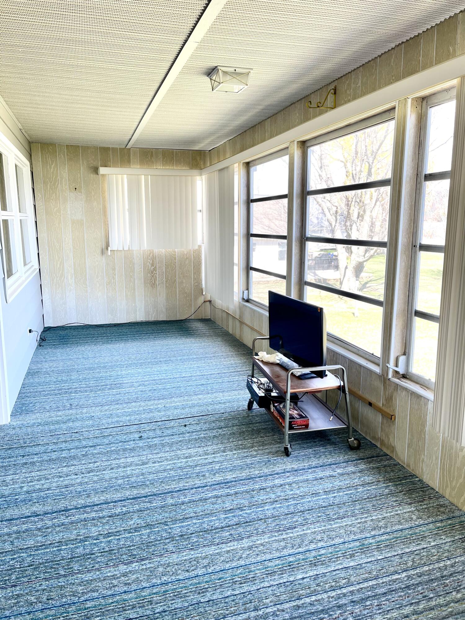 8703 Bayview Road Onekama, MI 49675 - Photo 13 of 25 Upper Sunroom