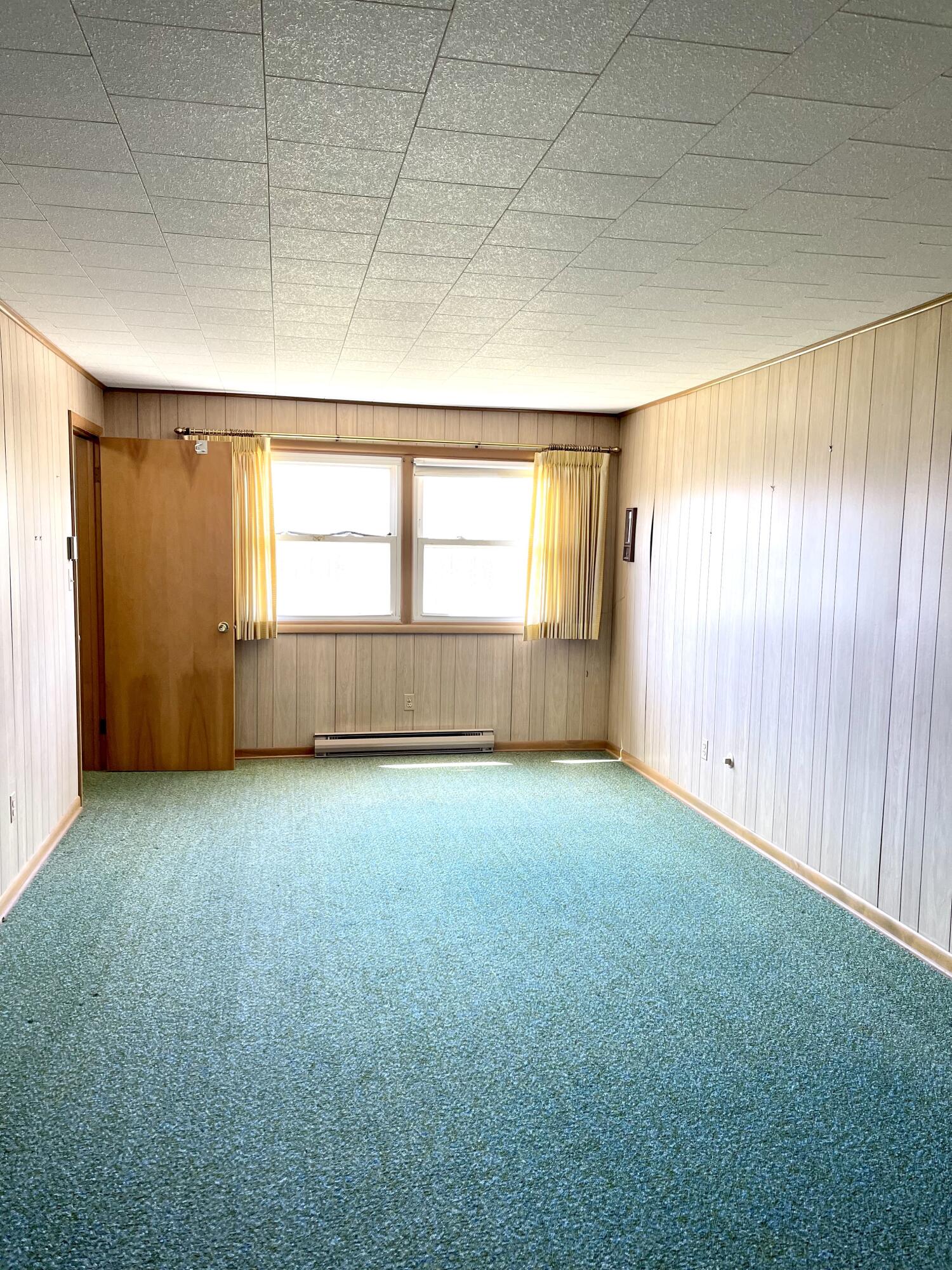 8703 Bayview Road Onekama, MI 49675 - Photo 17 of 25 Upper Bedroom