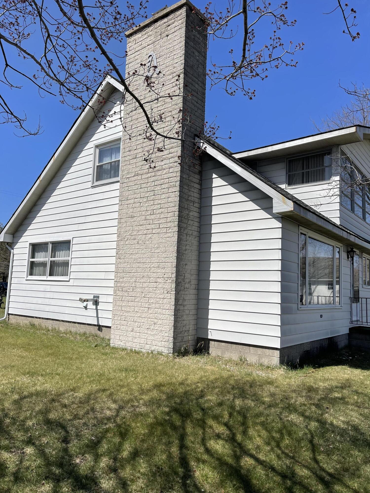 8703 Bayview Road Onekama, MI 49675 - Photo 3 of 25 South Side of Home