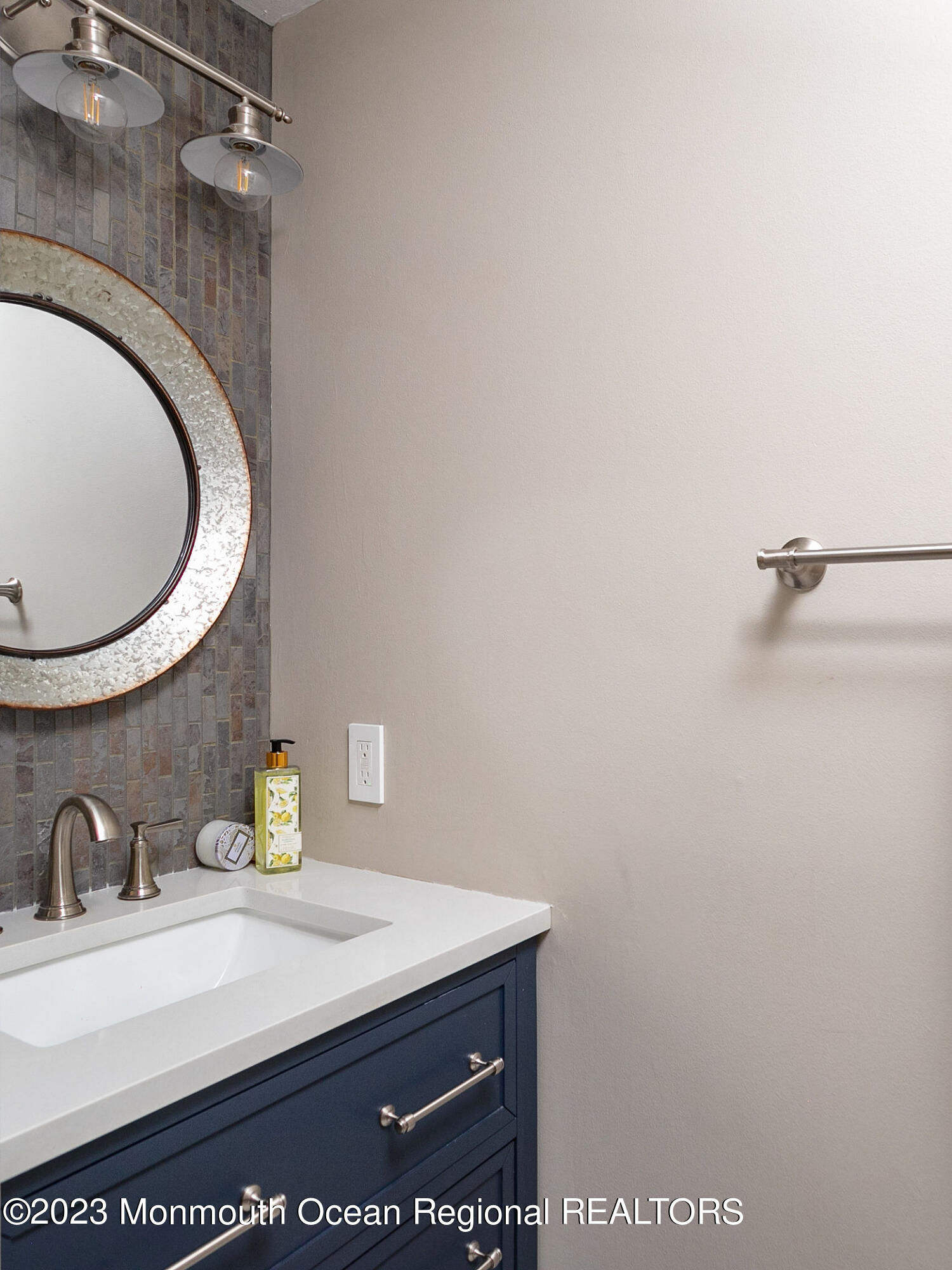 9 Laurel Drive Wrightstown, NJ 08562 - Photo 27 of 66 a bathroom with a sink and a mirror