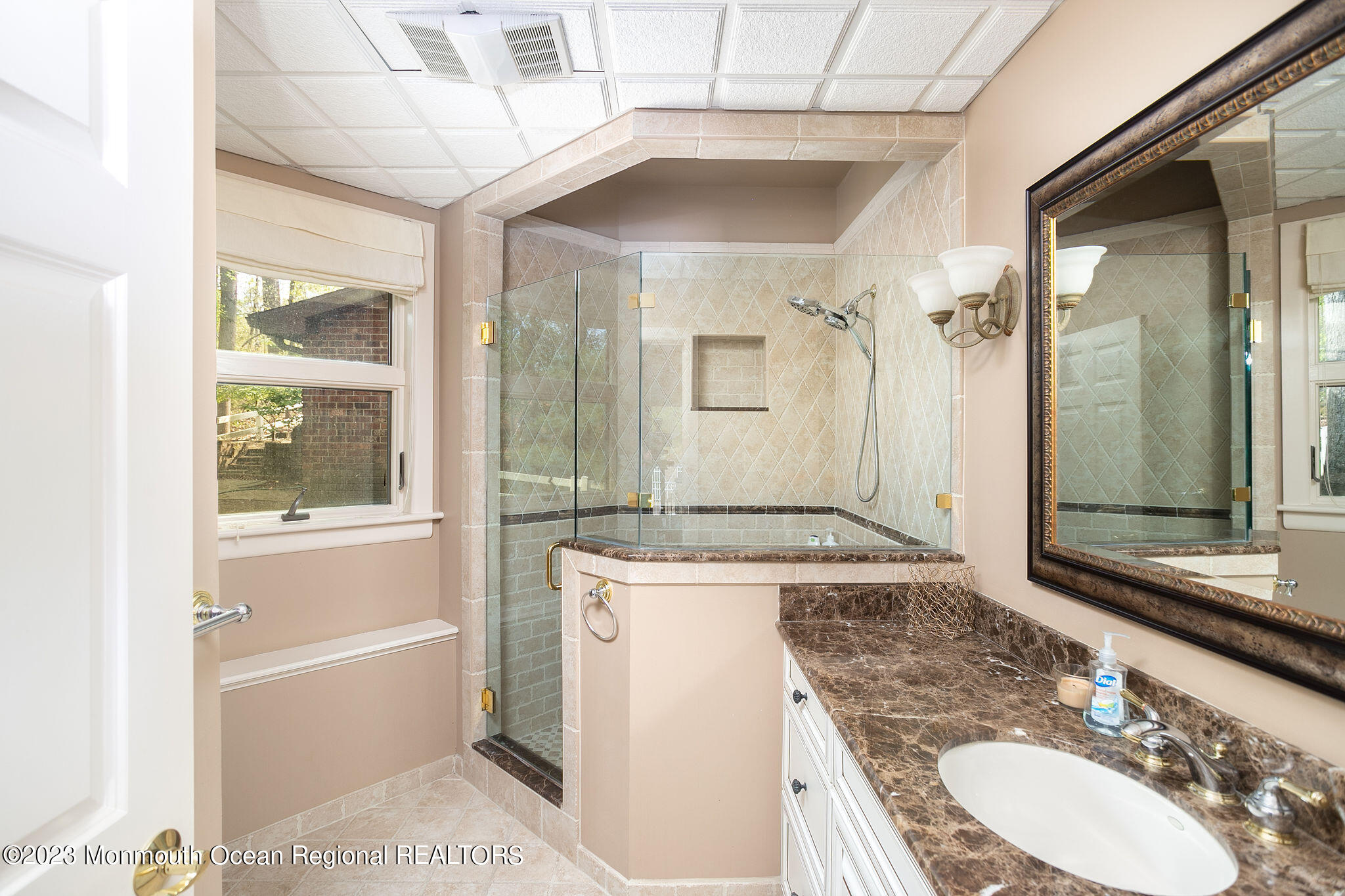 9 Laurel Drive Wrightstown, NJ 08562 - Photo 41 of 66 a bathroom with a granite countertop sink mirror vanity and bathtub