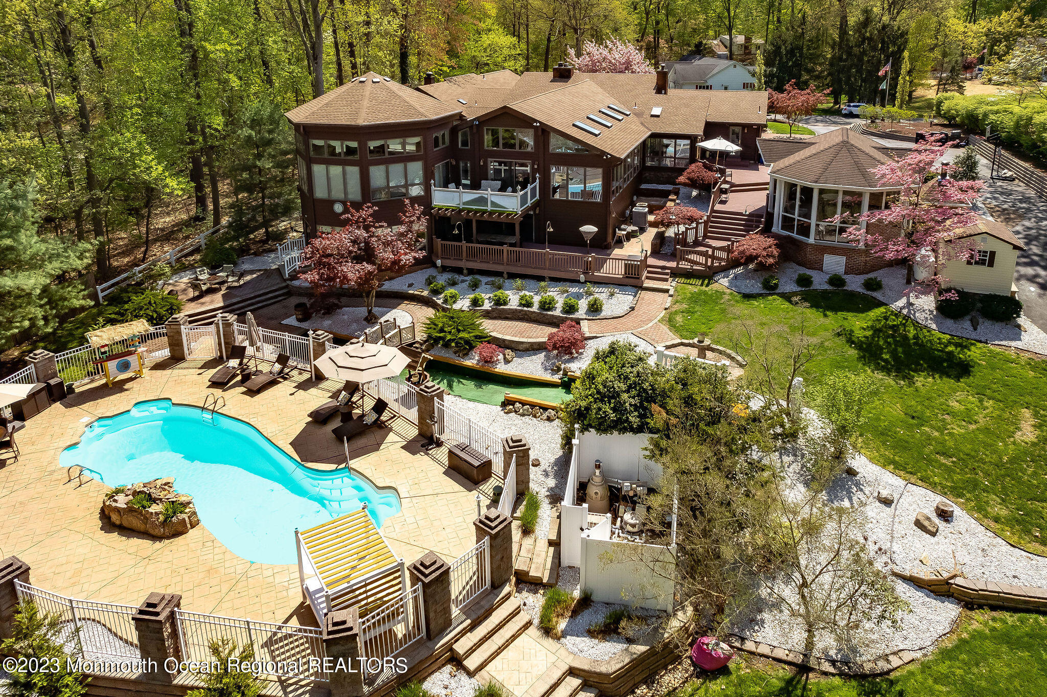 9 Laurel Drive Wrightstown, NJ 08562 - Photo 45 of 66 a aerial view of a house with swimming pool and outdoor seating