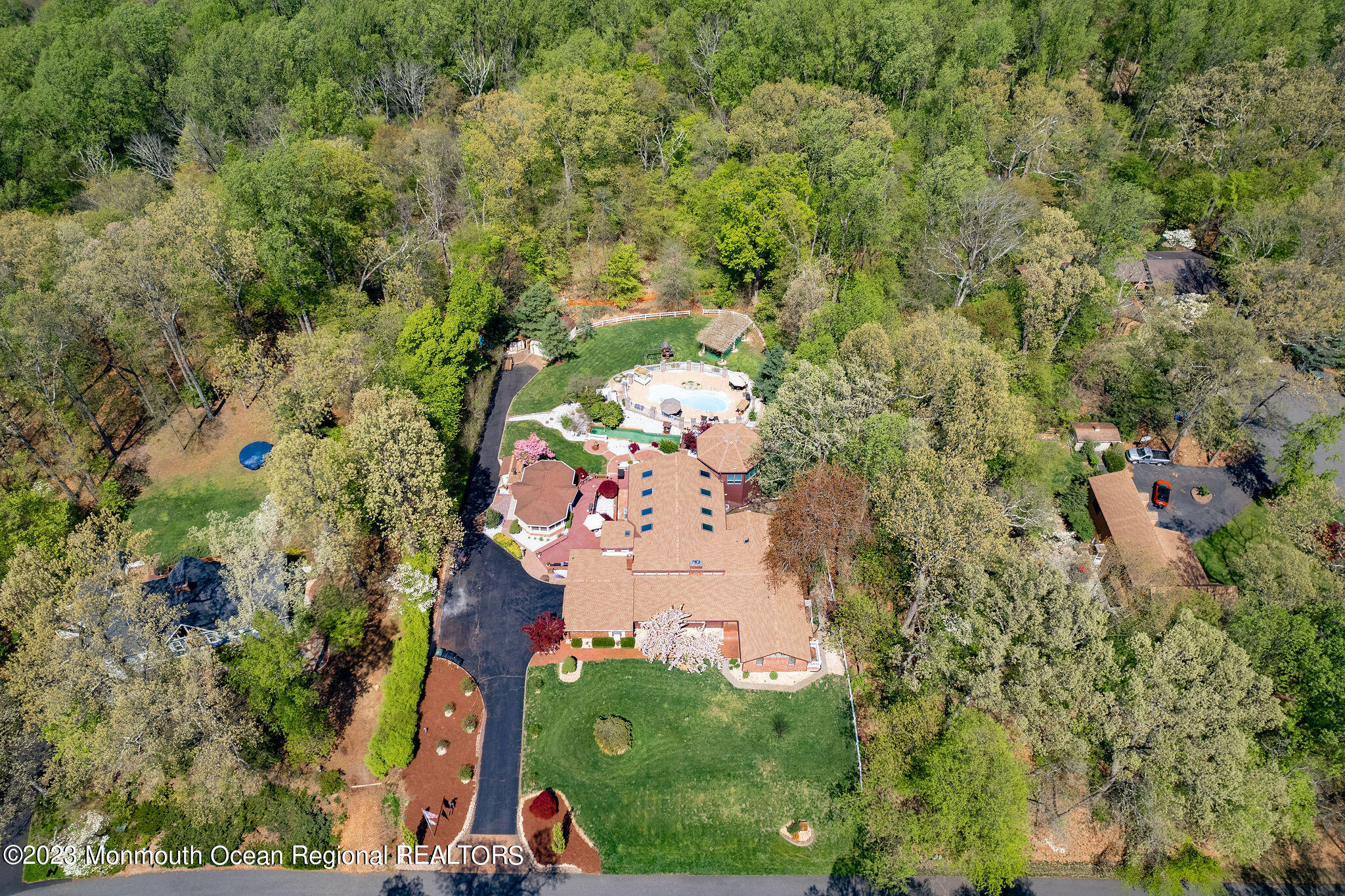 9 Laurel Drive Wrightstown, NJ 08562 - Photo 64 of 66 an aerial view of a house with a yard and large tree