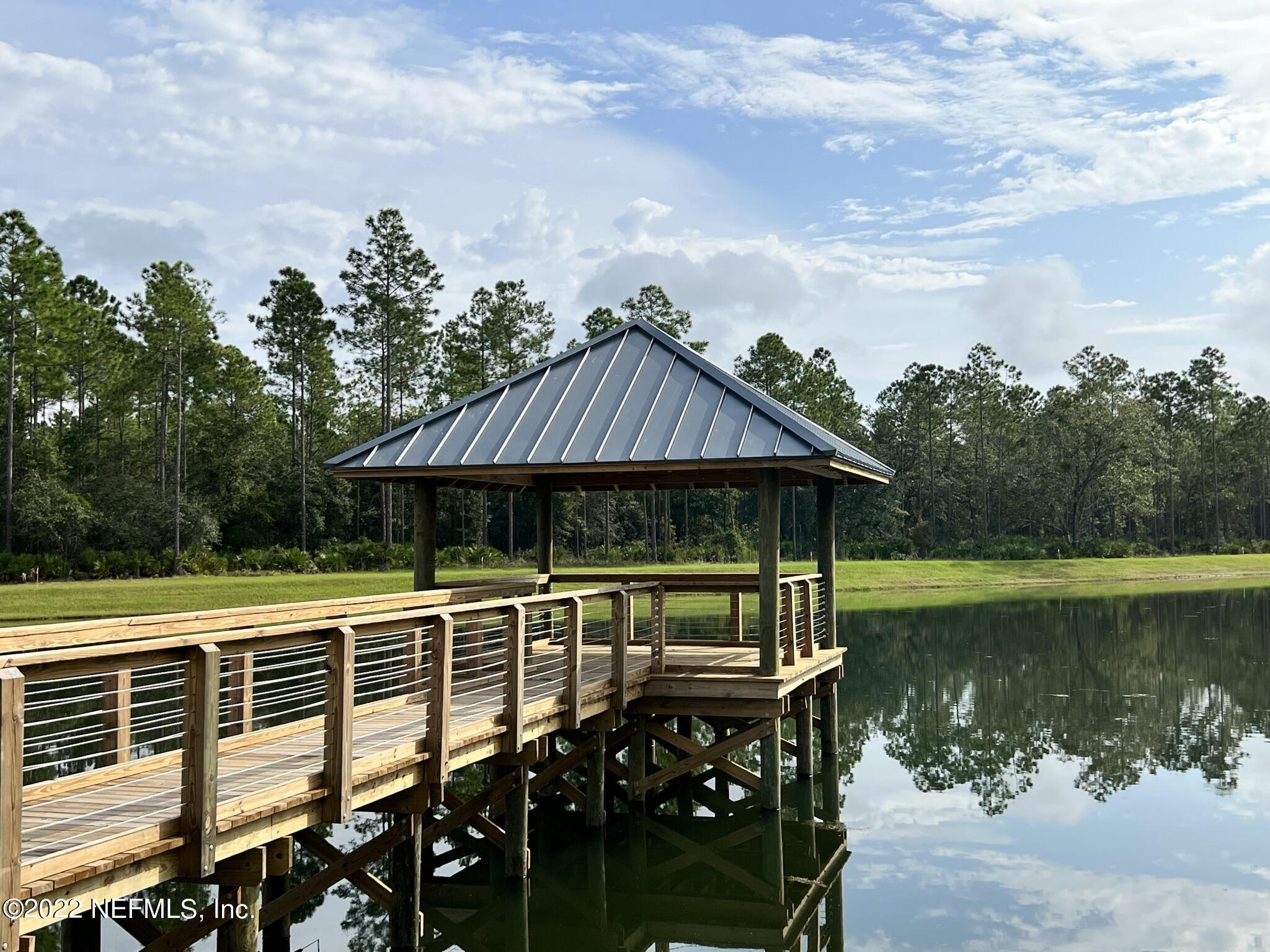 156 Fly Line Drive St. Johns, FL 32259 - Photo 47 of 51 a view of a swimming pool with a deck