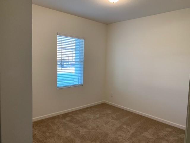 604 Indian Creek Anna, TX 75409 - Photo 3 of 12 an empty room with a window