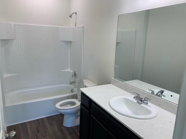 604 Indian Creek Anna, TX 75409 - Photo 9 of 12 a bathroom with a sink toilet and shower