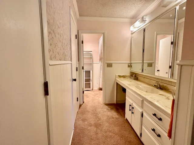 a bathroom with a tub and shower