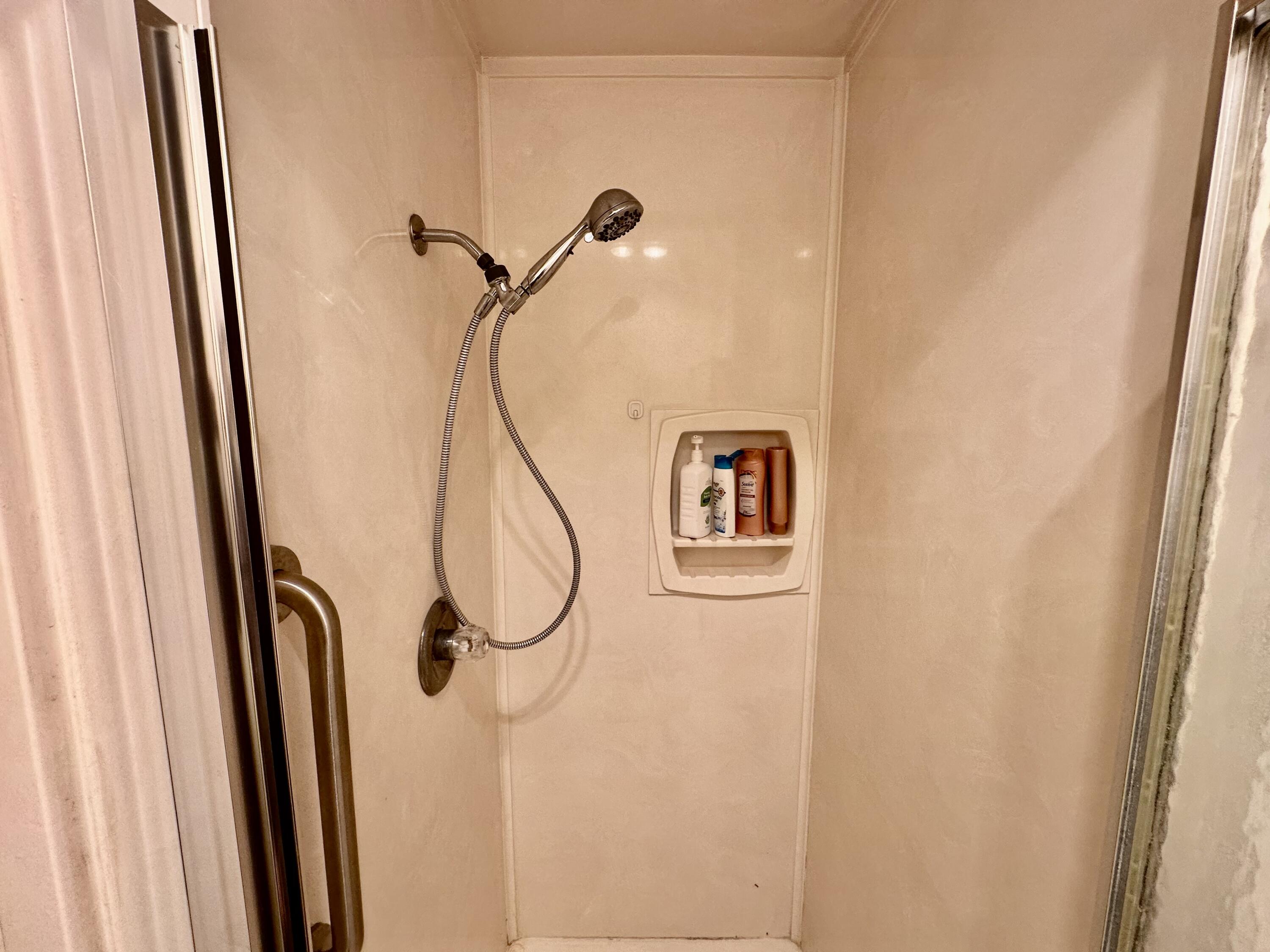 7844 Fm 1318 Tulia, TX 79088 - Photo 32 of 42 a bathroom with a shower