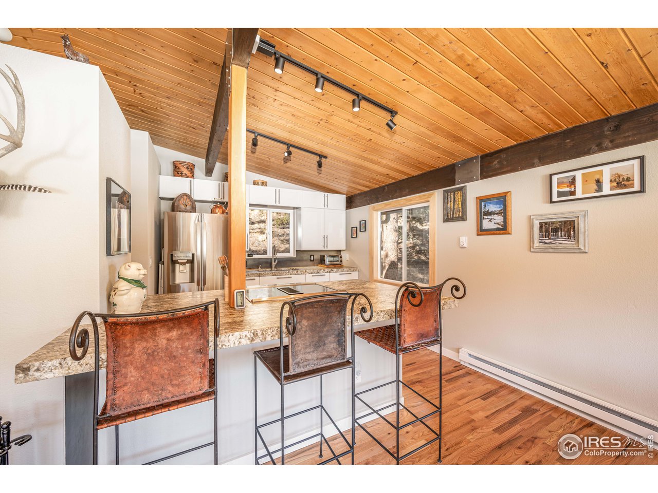 245 Hemlock Drive Lyons, CO 80540 - Photo 7 of 34 a view of a living room and kitchen