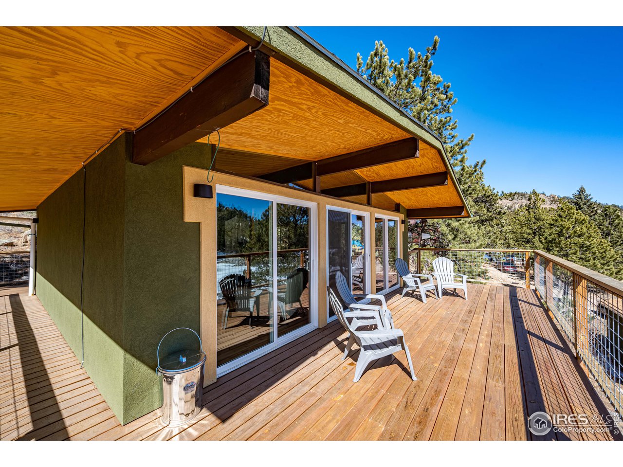 245 Hemlock Drive Lyons, CO 80540 - Photo 8 of 34 a outdoor view of a house with sitting space