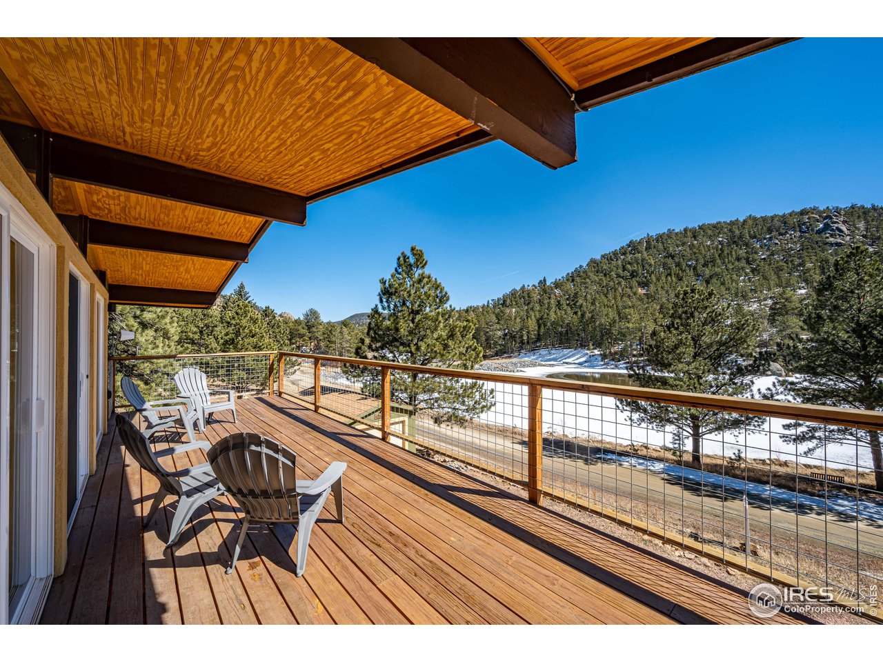 245 Hemlock Drive Lyons, CO 80540 - Photo 9 of 34 a view of balcony with furniture and outdoor space