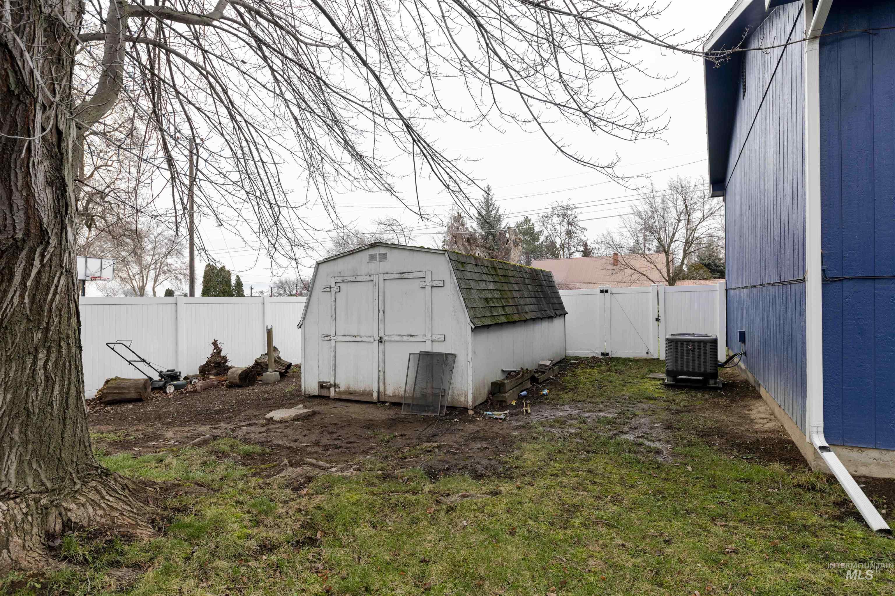 930 Preston Avenue Lewiston, ID 83501 - Photo 26 of 32 View of shed with a fenced backyard and a gate