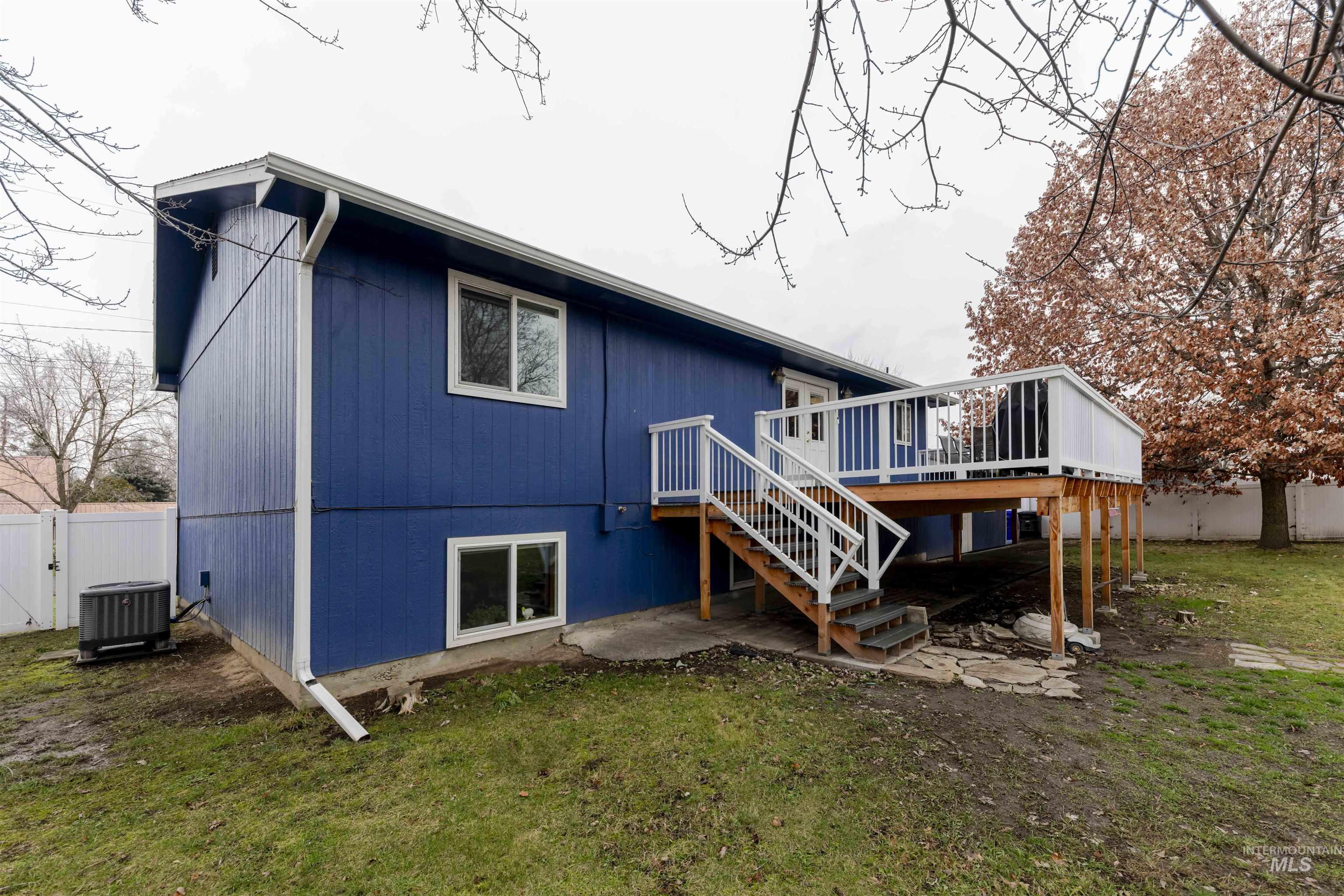 930 Preston Avenue Lewiston, ID 83501 - Photo 27 of 32 Back of property featuring stairway, a deck, and a patio