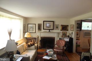 3 West Chelfield Road Glenside, PA 19038 - Photo 2 of 12 Living room with fireplace.