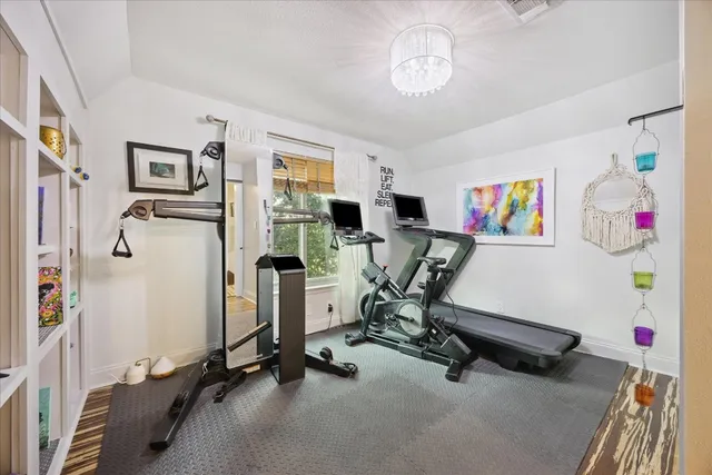 a view of a room with gym equipment