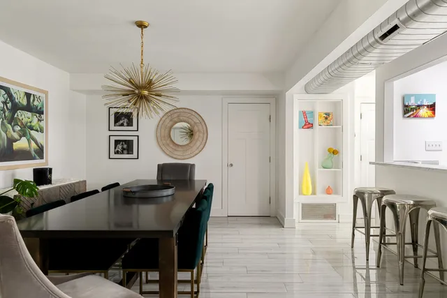 a view of a dining room with furniture