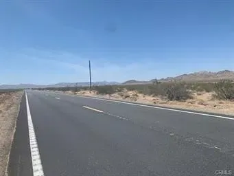 a view of a big room with mountain view